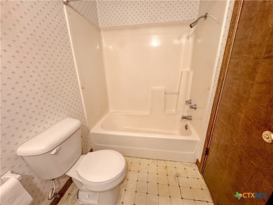 Welcome to 110 Lakewood Drive--an affordable, well-built brick on Gatesville Country Club in Texas - for sale on GolfHomes.com, golf home, golf lot