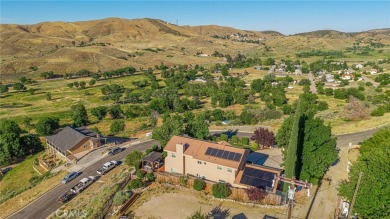 Discover the perfect mix of comfort and country charm in this on Lake Elizabeth Golf and Ranch Club in California - for sale on GolfHomes.com, golf home, golf lot