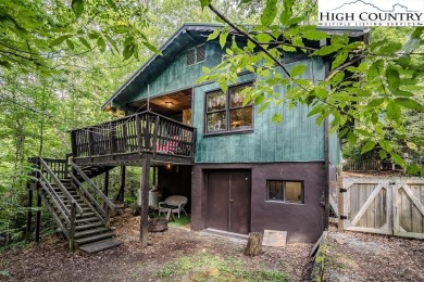 Cute Year Round Mountain Cabin.  Open floor plan with fantastic on Land Harbor Golf Course in North Carolina - for sale on GolfHomes.com, golf home, golf lot