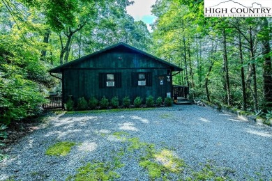 Cute Year Round Mountain Cabin.  Open floor plan with fantastic on Land Harbor Golf Course in North Carolina - for sale on GolfHomes.com, golf home, golf lot