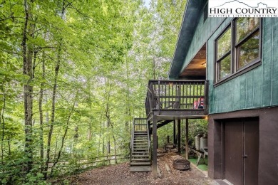Cute Year Round Mountain Cabin.  Open floor plan with fantastic on Land Harbor Golf Course in North Carolina - for sale on GolfHomes.com, golf home, golf lot