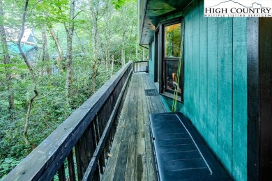 Cute Year Round Mountain Cabin.  Open floor plan with fantastic on Land Harbor Golf Course in North Carolina - for sale on GolfHomes.com, golf home, golf lot