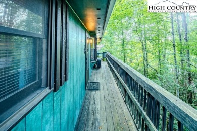 Cute Year Round Mountain Cabin.  Open floor plan with fantastic on Land Harbor Golf Course in North Carolina - for sale on GolfHomes.com, golf home, golf lot