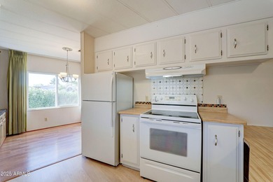 Discover comfort, convenience, and resort-style living in this on Sun Lakes Country Club in Arizona - for sale on GolfHomes.com, golf home, golf lot