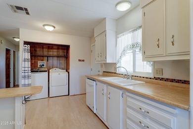 Discover comfort, convenience, and resort-style living in this on Sun Lakes Country Club in Arizona - for sale on GolfHomes.com, golf home, golf lot