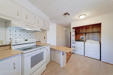 Discover comfort, convenience, and resort-style living in this on Sun Lakes Country Club in Arizona - for sale on GolfHomes.com, golf home, golf lot