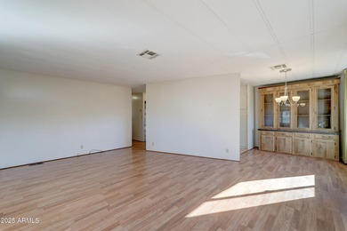 Discover comfort, convenience, and resort-style living in this on Sun Lakes Country Club in Arizona - for sale on GolfHomes.com, golf home, golf lot