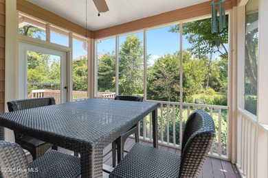 Experience coastal living in this charming 3-bedroom, 2-bath on Members Club At St. James Plantation in North Carolina - for sale on GolfHomes.com, golf home, golf lot