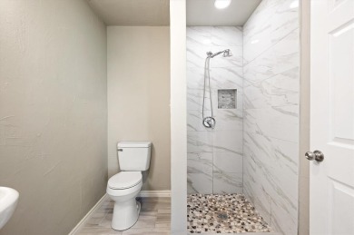 Set in the Valwood Park subdivision of Farmers Branch, this on Brookhaven Country Club - Golf Course in Texas - for sale on GolfHomes.com, golf home, golf lot