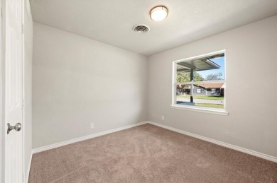 Set in the Valwood Park subdivision of Farmers Branch, this on Brookhaven Country Club - Golf Course in Texas - for sale on GolfHomes.com, golf home, golf lot