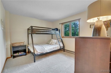Welcome to this charming three-bedroom, two-and-a-half-bathroom on Holiday Valley Resort in New York - for sale on GolfHomes.com, golf home, golf lot