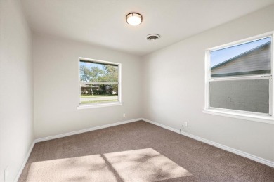 Set in the Valwood Park subdivision of Farmers Branch, this on Brookhaven Country Club - Golf Course in Texas - for sale on GolfHomes.com, golf home, golf lot