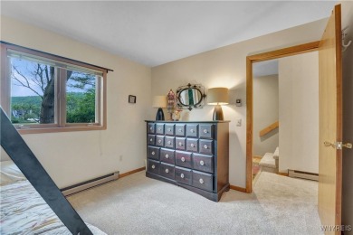 Welcome to this charming three-bedroom, two-and-a-half-bathroom on Holiday Valley Resort in New York - for sale on GolfHomes.com, golf home, golf lot