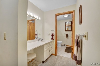 Welcome to this charming three-bedroom, two-and-a-half-bathroom on Holiday Valley Resort in New York - for sale on GolfHomes.com, golf home, golf lot