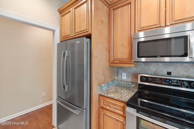 Experience coastal living in this charming 3-bedroom, 2-bath on Members Club At St. James Plantation in North Carolina - for sale on GolfHomes.com, golf home, golf lot