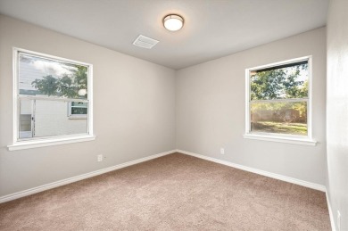 Set in the Valwood Park subdivision of Farmers Branch, this on Brookhaven Country Club - Golf Course in Texas - for sale on GolfHomes.com, golf home, golf lot