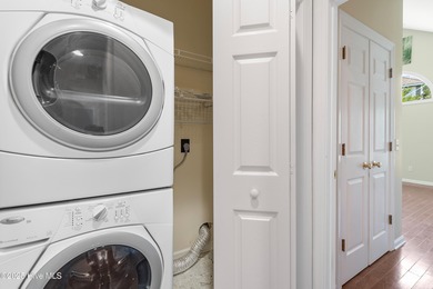 Experience coastal living in this charming 3-bedroom, 2-bath on Members Club At St. James Plantation in North Carolina - for sale on GolfHomes.com, golf home, golf lot