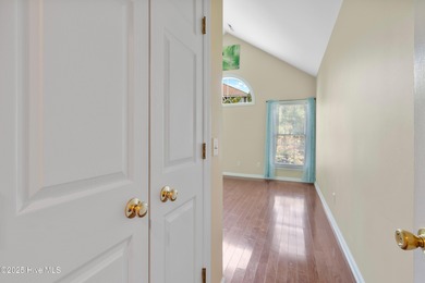 Experience coastal living in this charming 3-bedroom, 2-bath on Members Club At St. James Plantation in North Carolina - for sale on GolfHomes.com, golf home, golf lot