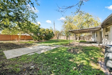 Set in the Valwood Park subdivision of Farmers Branch, this on Brookhaven Country Club - Golf Course in Texas - for sale on GolfHomes.com, golf home, golf lot