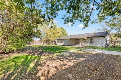 Set in the Valwood Park subdivision of Farmers Branch, this on Brookhaven Country Club - Golf Course in Texas - for sale on GolfHomes.com, golf home, golf lot