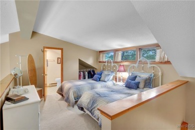 Welcome to this charming three-bedroom, two-and-a-half-bathroom on Holiday Valley Resort in New York - for sale on GolfHomes.com, golf home, golf lot