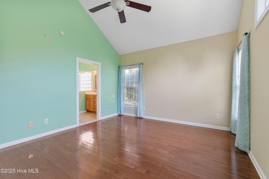 Experience coastal living in this charming 3-bedroom, 2-bath on Members Club At St. James Plantation in North Carolina - for sale on GolfHomes.com, golf home, golf lot