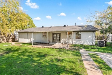 Set in the Valwood Park subdivision of Farmers Branch, this on Brookhaven Country Club - Golf Course in Texas - for sale on GolfHomes.com, golf home, golf lot
