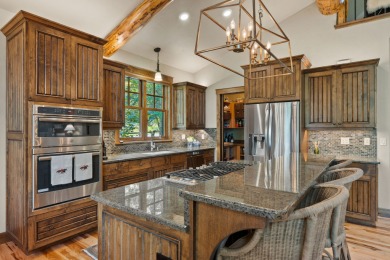 Elegant and distinctive, this Whispering Rock residence offers on Eagle Bend Golf Course in Montana - for sale on GolfHomes.com, golf home, golf lot