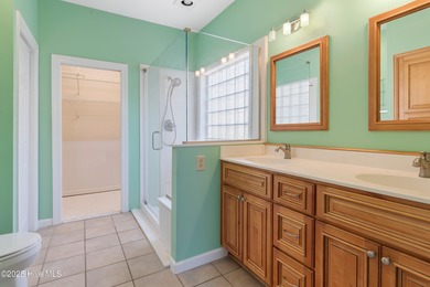 Experience coastal living in this charming 3-bedroom, 2-bath on Members Club At St. James Plantation in North Carolina - for sale on GolfHomes.com, golf home, golf lot