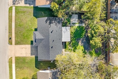 Set in the Valwood Park subdivision of Farmers Branch, this on Brookhaven Country Club - Golf Course in Texas - for sale on GolfHomes.com, golf home, golf lot