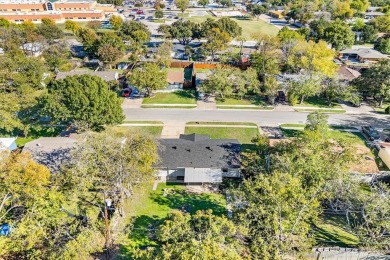 Set in the Valwood Park subdivision of Farmers Branch, this on Brookhaven Country Club - Golf Course in Texas - for sale on GolfHomes.com, golf home, golf lot