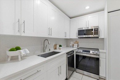 Wake up to soft morning light and tranquil lake views in this on Boca Lago Golf and Country Club in Florida - for sale on GolfHomes.com, golf home, golf lot