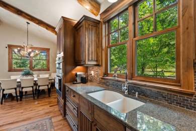 Elegant and distinctive, this Whispering Rock residence offers on Eagle Bend Golf Course in Montana - for sale on GolfHomes.com, golf home, golf lot
