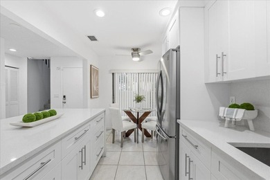 Wake up to soft morning light and tranquil lake views in this on Boca Lago Golf and Country Club in Florida - for sale on GolfHomes.com, golf home, golf lot