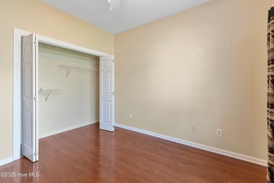 Experience coastal living in this charming 3-bedroom, 2-bath on Members Club At St. James Plantation in North Carolina - for sale on GolfHomes.com, golf home, golf lot