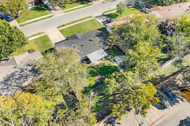 Set in the Valwood Park subdivision of Farmers Branch, this on Brookhaven Country Club - Golf Course in Texas - for sale on GolfHomes.com, golf home, golf lot