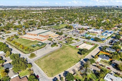 Set in the Valwood Park subdivision of Farmers Branch, this on Brookhaven Country Club - Golf Course in Texas - for sale on GolfHomes.com, golf home, golf lot