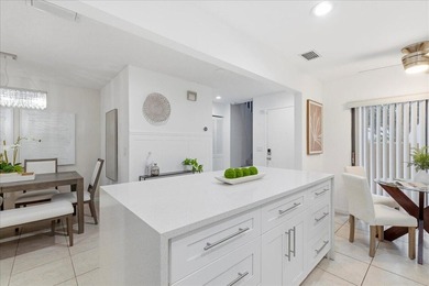 Wake up to soft morning light and tranquil lake views in this on Boca Lago Golf and Country Club in Florida - for sale on GolfHomes.com, golf home, golf lot