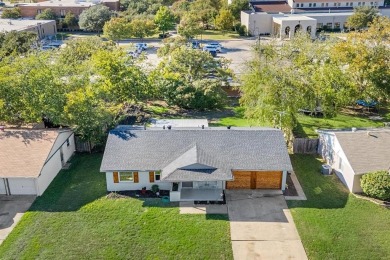 Set in the Valwood Park subdivision of Farmers Branch, this on Brookhaven Country Club - Golf Course in Texas - for sale on GolfHomes.com, golf home, golf lot