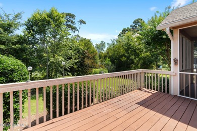 Experience coastal living in this charming 3-bedroom, 2-bath on Members Club At St. James Plantation in North Carolina - for sale on GolfHomes.com, golf home, golf lot