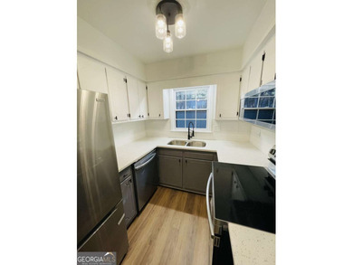 NEWLY RENOVATED TOWNHOUSE - A MUST SEE! Step into this inviting on Cross Creek Golf Course in Georgia - for sale on GolfHomes.com, golf home, golf lot