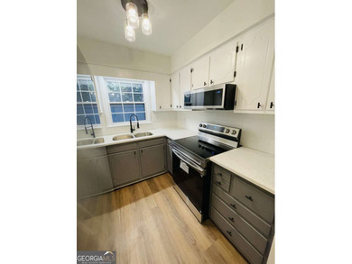 NEWLY RENOVATED TOWNHOUSE - A MUST SEE! Step into this inviting on Cross Creek Golf Course in Georgia - for sale on GolfHomes.com, golf home, golf lot