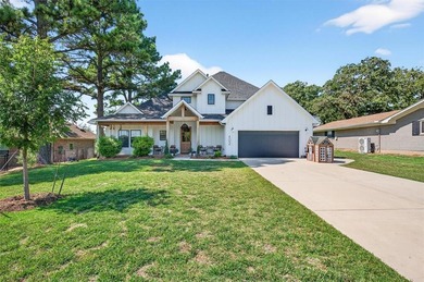 Welcome to this thoughtfully designed custom home where comfort on Lake Kiowa Golf Course in Texas - for sale on GolfHomes.com, golf home, golf lot