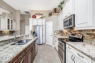 Beautifully remodeled 4BR/3BA home in the exclusive gated golf on The Club At Pelican Bay - North Course in Florida - for sale on GolfHomes.com, golf home, golf lot