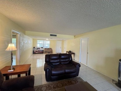 Exceptional opportunity to acquire a spacious 3-bedroom on Oaks Country Club in Florida - for sale on GolfHomes.com, golf home, golf lot