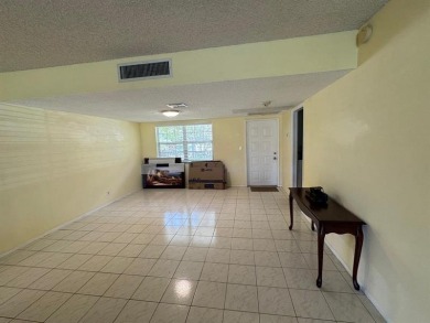 Exceptional opportunity to acquire a spacious 3-bedroom on Oaks Country Club in Florida - for sale on GolfHomes.com, golf home, golf lot