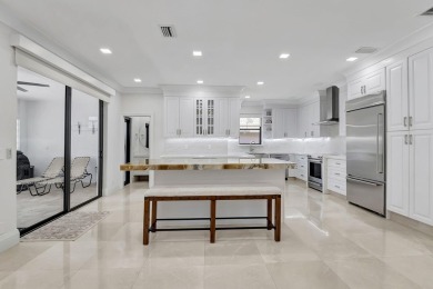 10099 Canoe Brook Circle on Boca Greens Country Club in Florida - for sale on GolfHomes.com, golf home, golf lot