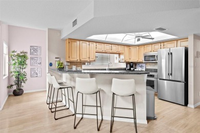 Experience maintenance-free living in this spacious 3-story on Pasadena Yacht and Country Club in Florida - for sale on GolfHomes.com, golf home, golf lot