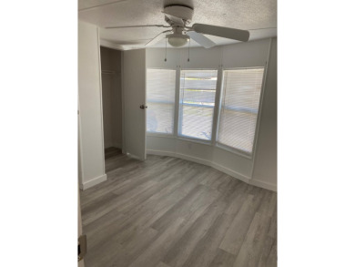 $36,000 Is a great deal, we are looking for a quick sale, in on Lake Henry Golf Club in Florida - for sale on GolfHomes.com, golf home, golf lot