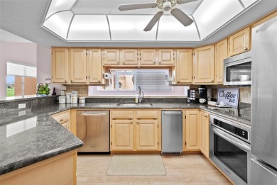 Experience maintenance-free living in this spacious 3-story on Pasadena Yacht and Country Club in Florida - for sale on GolfHomes.com, golf home, golf lot